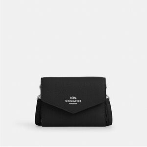 NWOT Coach Outlet Mini Envelope
Wallet Strap
